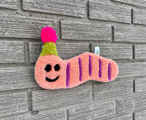 Worm with Party Hat Tufted Wall Hanging: Peach