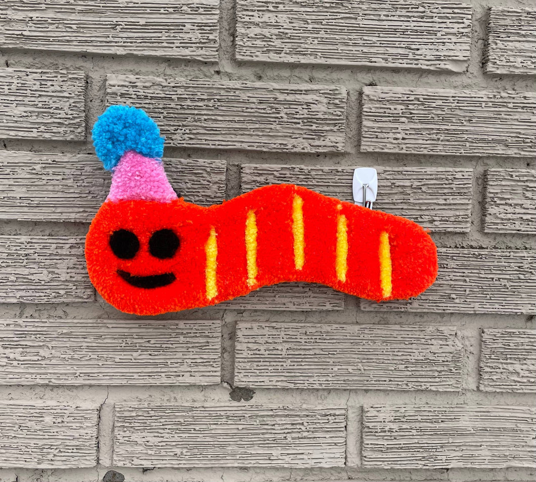 Worm with Party Hat Tufted Wall Hanging: Orange